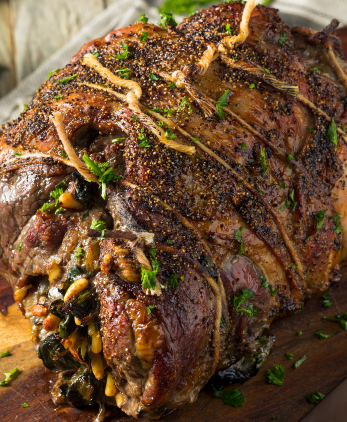Spinach-stuffed lamb roast